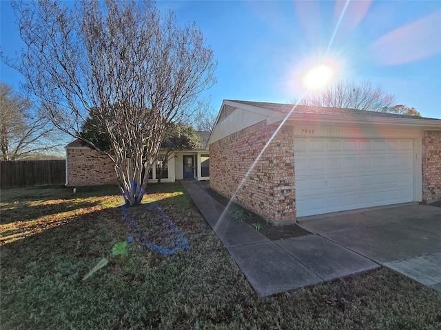 view of side of property with a garage