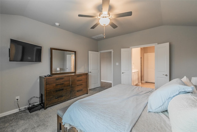 bedroom featuring connected bathroom, ceiling fan, carpet floors, and vaulted ceiling