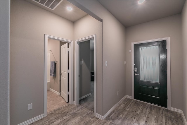 entrance foyer featuring hardwood / wood-style floors