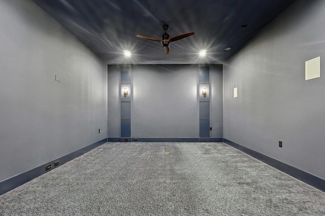 empty room with carpet floors and ceiling fan