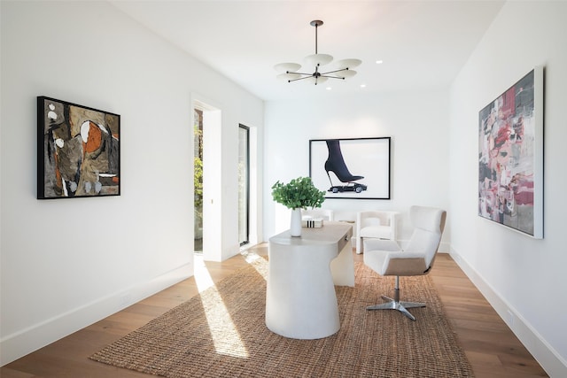 living area with light hardwood / wood-style flooring