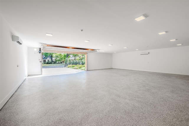 garage featuring an AC wall unit