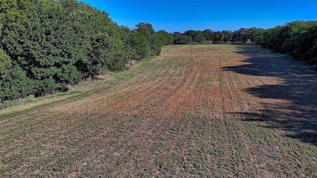 exterior space with a rural view