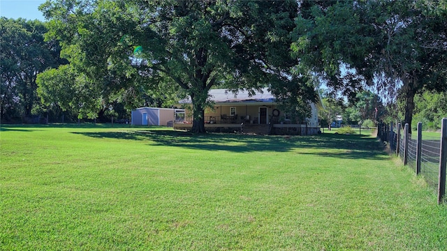 view of yard with a shed