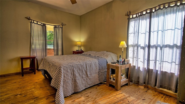 bedroom with wood-type flooring