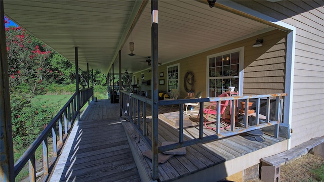 wooden deck with ceiling fan