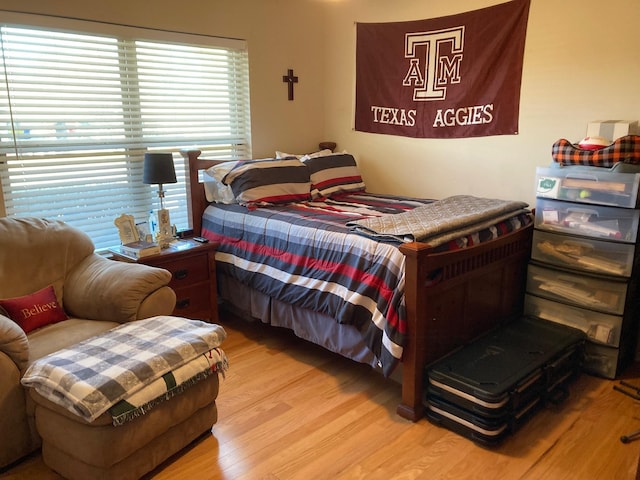 bedroom featuring light wood-type flooring