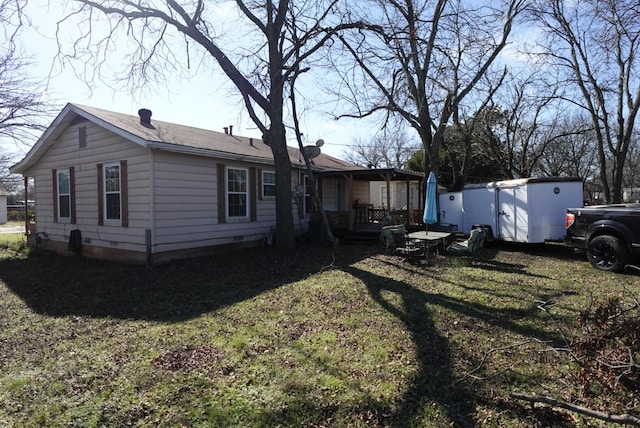 exterior space featuring a lawn