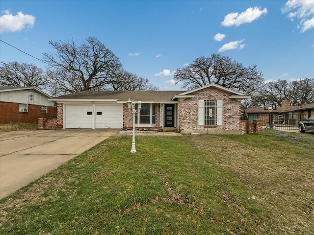 ranch-style house featuring a garage and a front lawn