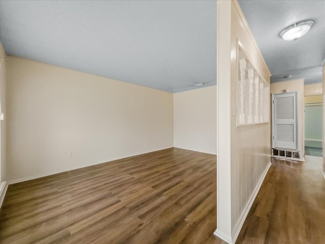 interior space with dark hardwood / wood-style flooring