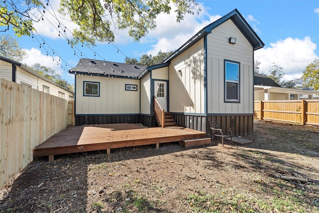 rear view of property with a deck