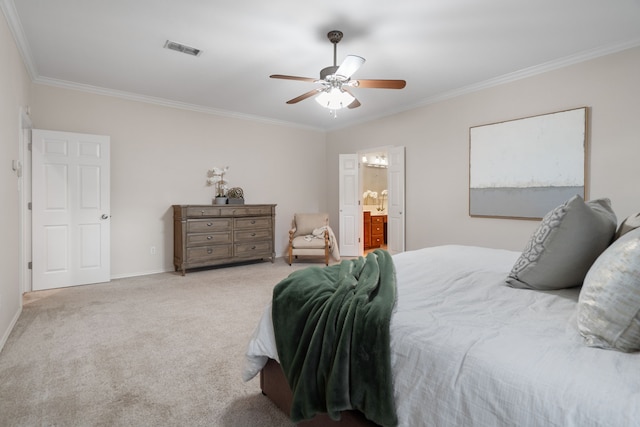 carpeted bedroom with ceiling fan, crown molding, and ensuite bathroom