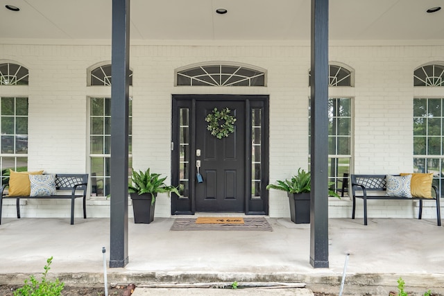 entrance to property with covered porch