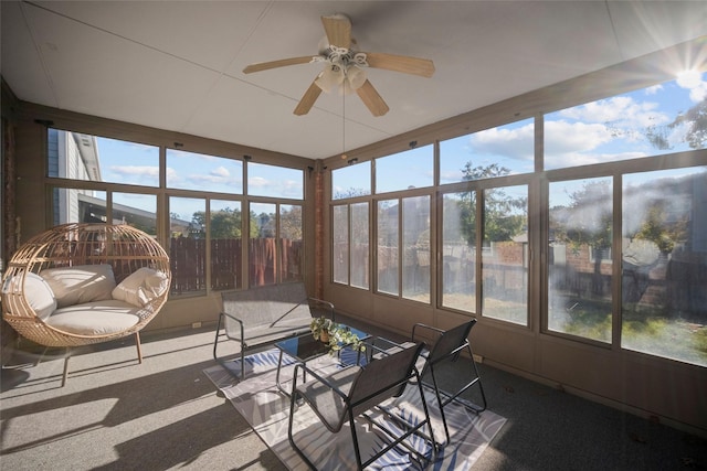 sunroom / solarium with ceiling fan