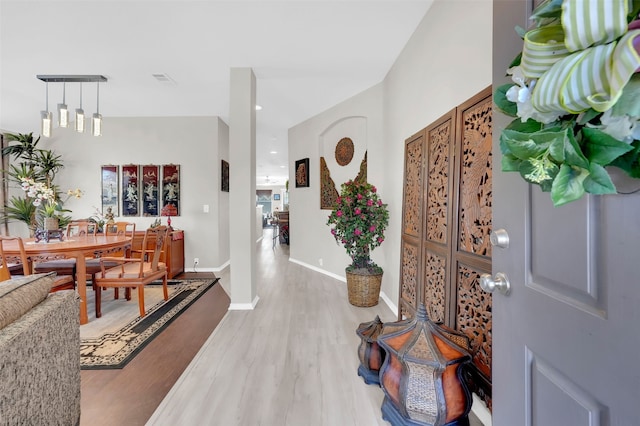 entrance foyer with light wood-type flooring