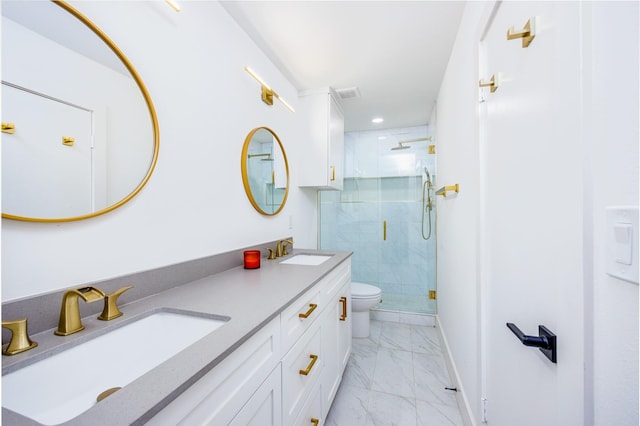 bathroom with a shower with door, vanity, and toilet