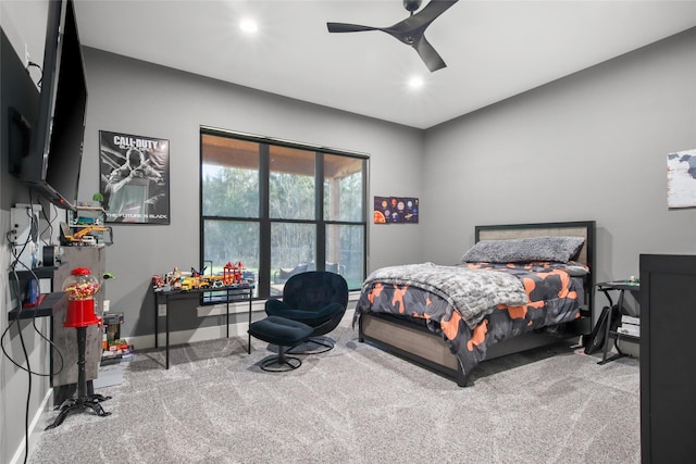 carpeted bedroom with ceiling fan