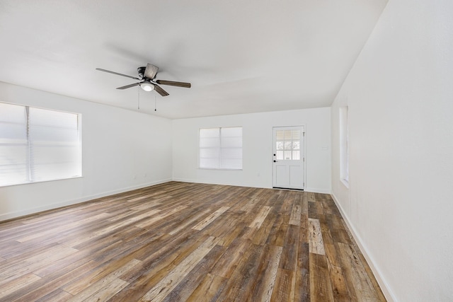 unfurnished living room featuring hardwood / wood-style floors and ceiling fan