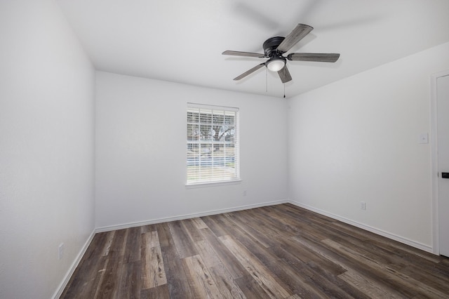 unfurnished room featuring dark hardwood / wood-style flooring and ceiling fan