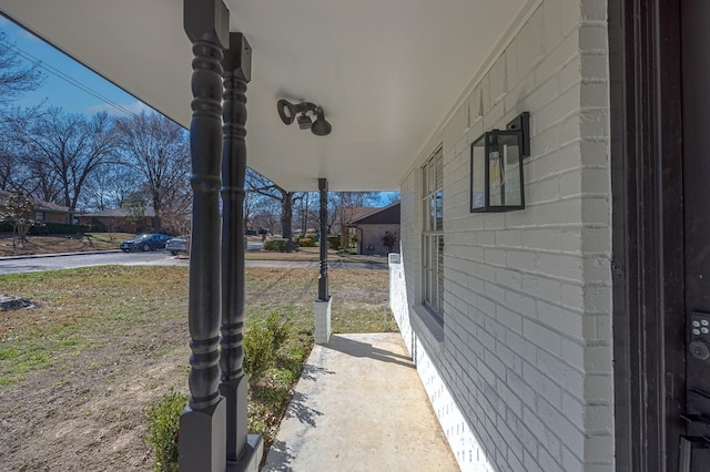 view of patio featuring a porch