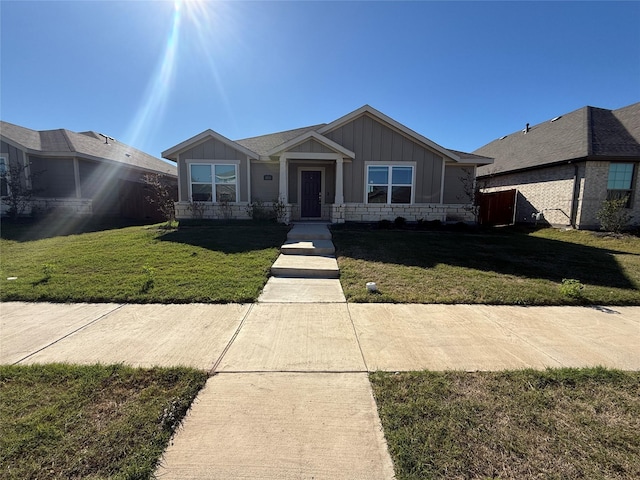 view of front of home with a front yard