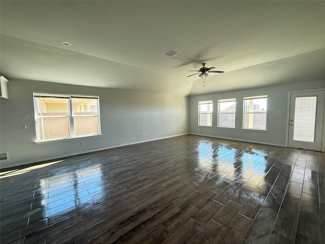 unfurnished room with ceiling fan and lofted ceiling