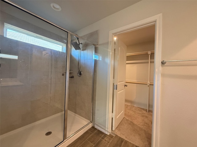 bathroom with an enclosed shower