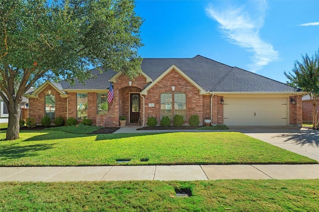 ranch-style house featuring a front yard and a garage