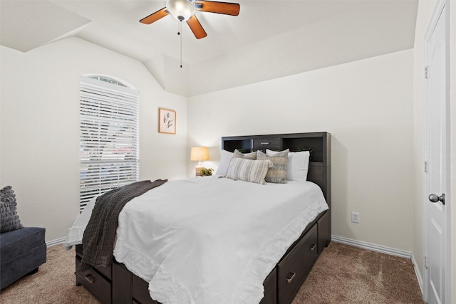 carpeted bedroom featuring ceiling fan and lofted ceiling