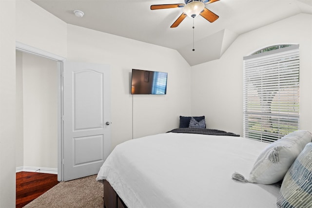 bedroom featuring vaulted ceiling and ceiling fan