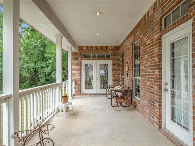 view of patio featuring french doors and covered porch