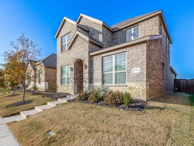 view of front of property with a front lawn