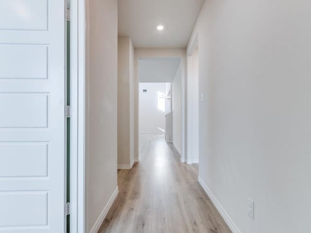 corridor featuring light wood-type flooring