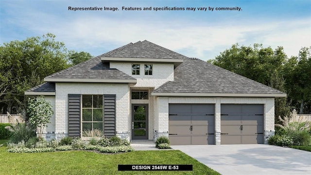 view of front facade featuring a front yard and a garage