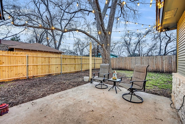 view of patio with a fenced backyard