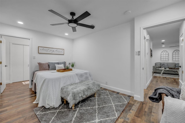 bedroom with recessed lighting, baseboards, and hardwood / wood-style floors