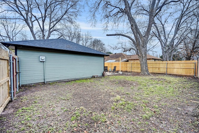 view of yard with a fenced backyard