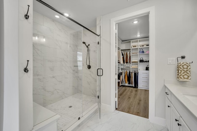 bathroom featuring vanity and walk in shower