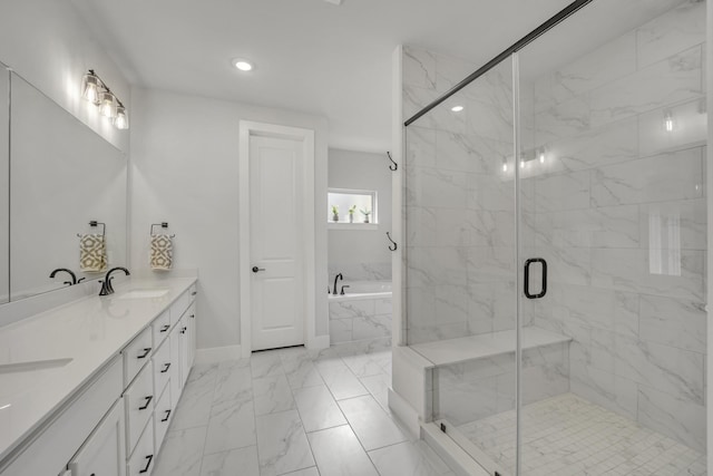 bathroom with independent shower and bath and vanity