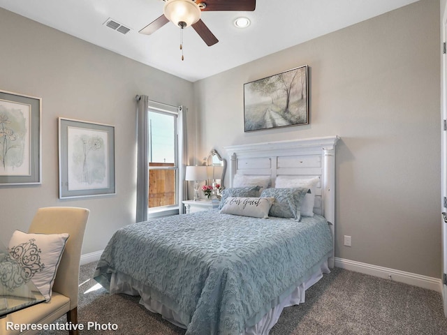 carpeted bedroom with ceiling fan