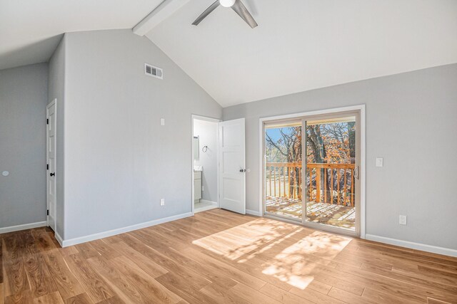 interior space featuring ceiling fan, light wood-type flooring, lofted ceiling with beams, and sink