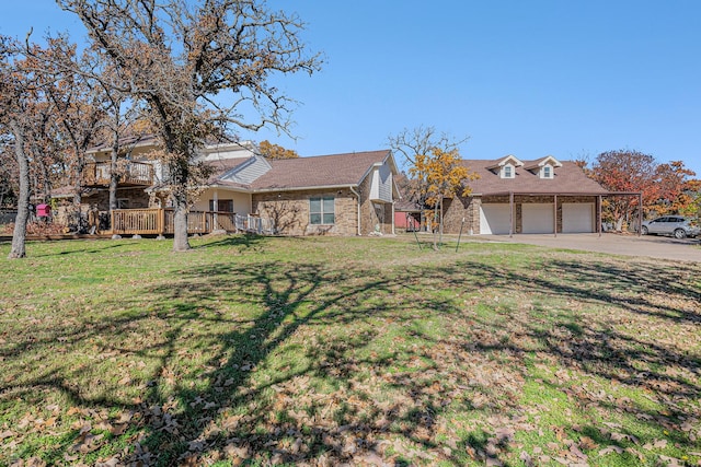 view of front facade with a front lawn and a garage