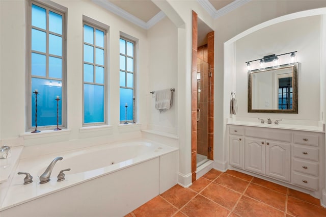 bathroom with vanity, tile patterned floors, ornamental molding, and separate shower and tub