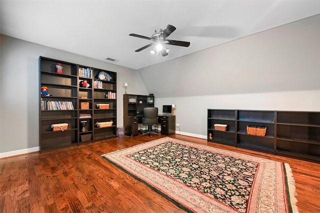 office space featuring ceiling fan, lofted ceiling, and dark hardwood / wood-style floors