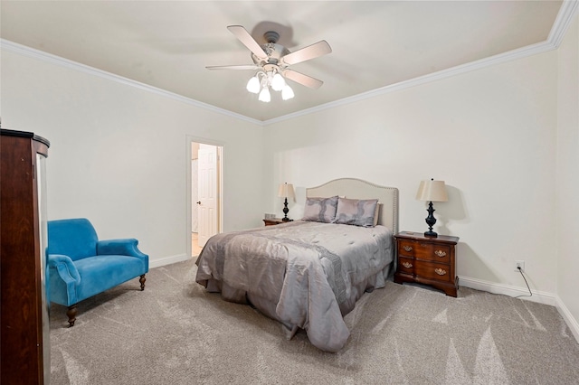 carpeted bedroom featuring ornamental molding and ceiling fan