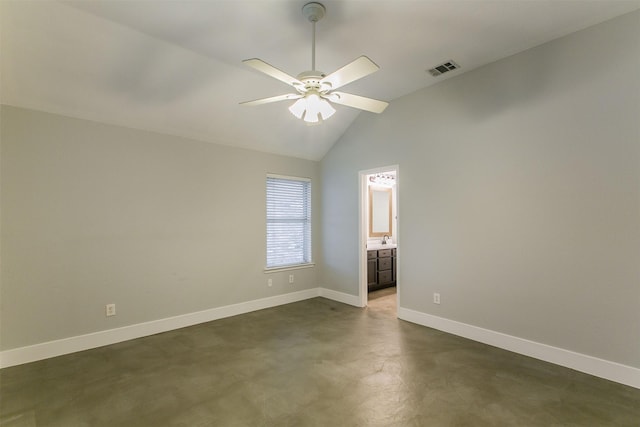 spare room with ceiling fan, lofted ceiling, and sink