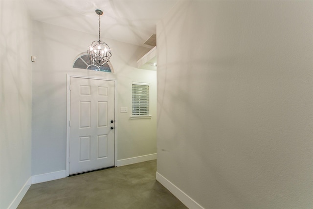 foyer entrance featuring a chandelier