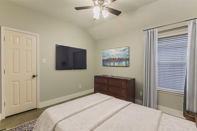 bedroom featuring ceiling fan and vaulted ceiling