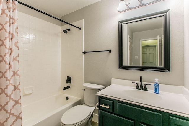 full bathroom with shower / tub combo, vanity, and toilet