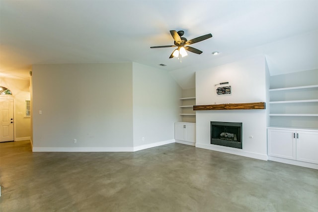 unfurnished living room featuring built in shelves, ceiling fan, and lofted ceiling